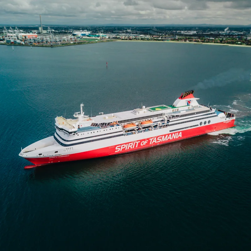 The Spirit of Tasmania ferry cruising across calm waters under a clear sky