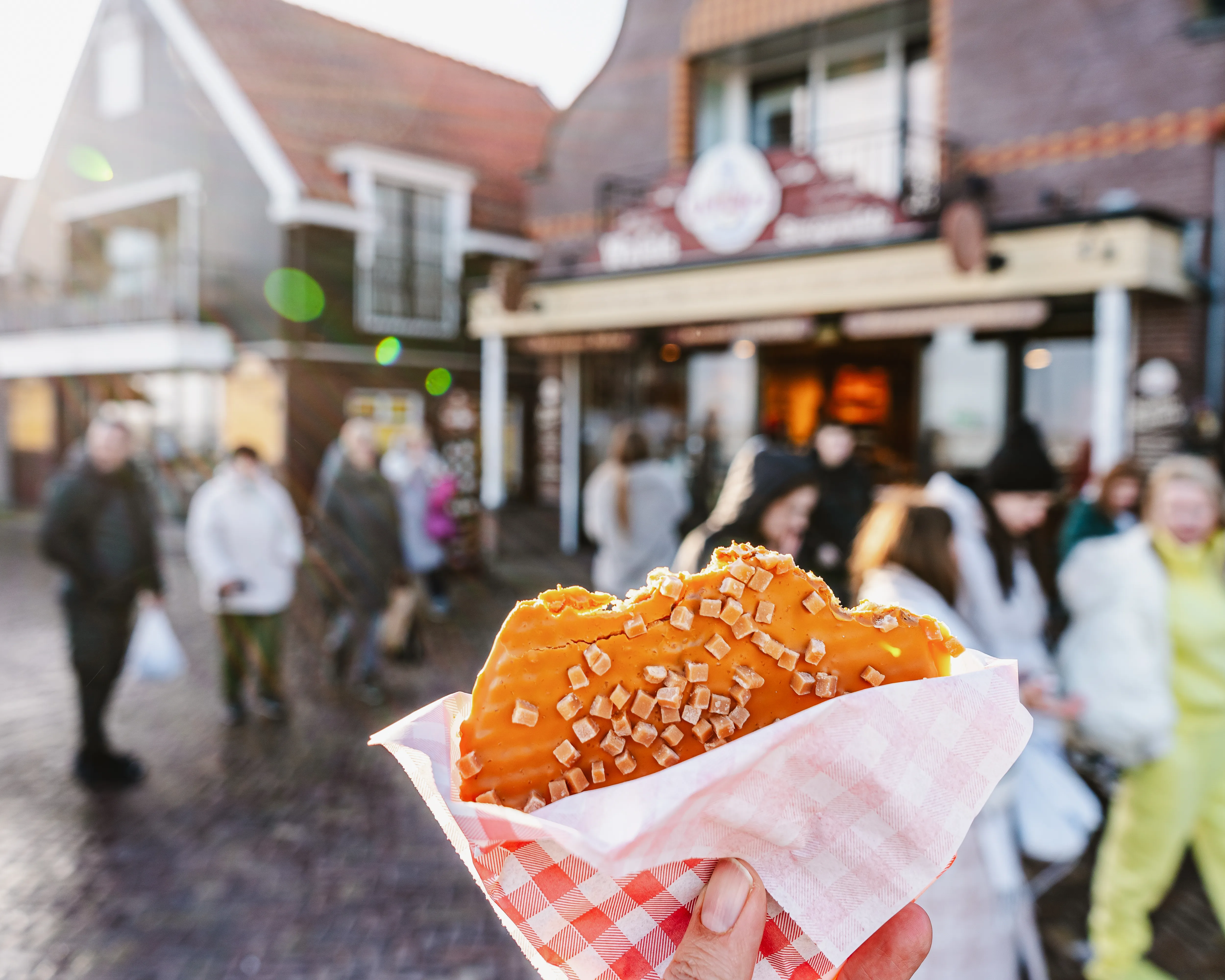 Traditional Dutch stroopwafel snack in Volendam, one of the best foodie day trips from Amsterdam.