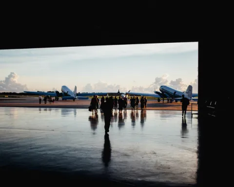 Airport runway with people walking