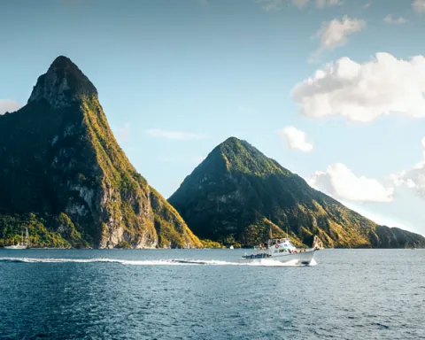 Stunning view of the Pitons in St Lucia, lush green mountains rising from the Caribbean Sea