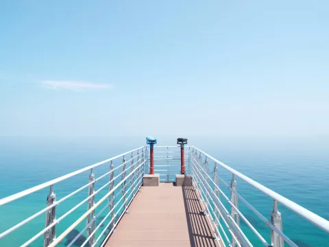 Cruise ship deck overlooking the ocean, representing cruise travel insurance and holiday cover